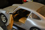 Modellbil. Porsche 911, "Carrera (1993)", skala 1:18, Burago.