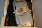 Modellbil. Porsche 911, "Carrera (1993)", skala 1:18, Burago.