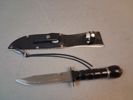 Kniv med kompass & slipsten i balja.