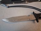Kniv med kompass & slipsten i balja.