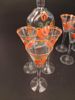 Julservis. 10 delar. glas, Snappsglas & brännvins flaska. Handmålad dekor. Johansfors.