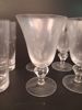 Diverse spritglas. 24 delar. Etsade stjärnor.