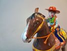 Plårleksak. "Cowboy med häst", Litograferad plåt, Haji, Japan.