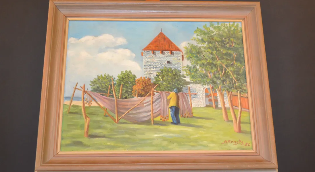 OIDENTIFIERAD KONSTNÄR. Olja på duk, "Kruttornet i Visby, fiskare vid sin båt", signerad M Bengts & daterad -56.