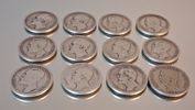 12 Stycken 1 Kronor. Silver 80%, 86gram.