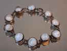 Collier, armband & örhängen, 1 par, silver med Cabochslipade månstenar, 63gram. Mattsson & Olsson, Malmö, 1950-talet.