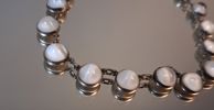 Collier, armband & örhängen, 1 par, silver med Cabochslipade månstenar, 63gram. Mattsson & Olsson, Malmö, 1950-talet.