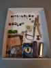 Diverse. Bl.a mynt, pins, 2 klockor, 2 munspel m.m.