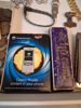 Diverse. Bl.a mynt, pins, 2 klockor, 2 munspel m.m.