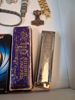 Diverse. Bl.a mynt, pins, 2 klockor, 2 munspel m.m.