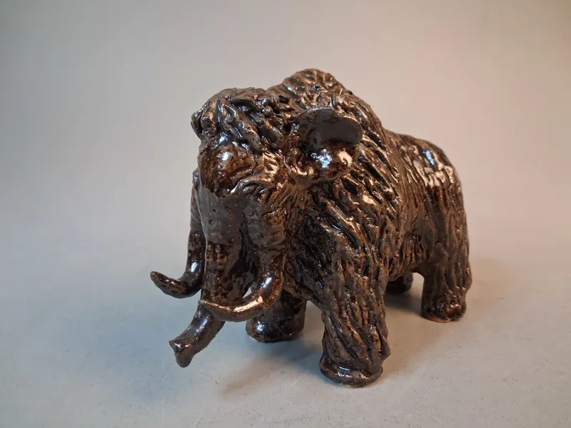 Bisonoxe, lergods. Tung, Oidentifierad.
