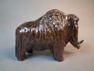 Bisonoxe, lergods. Tung, Oidentifierad.