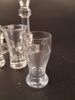 Diverse spritglas, bricka & ljusstakar.