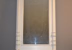 Spegel. 1900-Talets början, bemålad, fasettslipat glas.