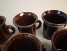 23 Glöggmuggar/kaffekoppar. Laholms keramik.